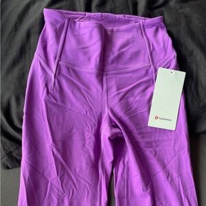 Size 4 NEVERWORN split bottom - too light of a Color for me